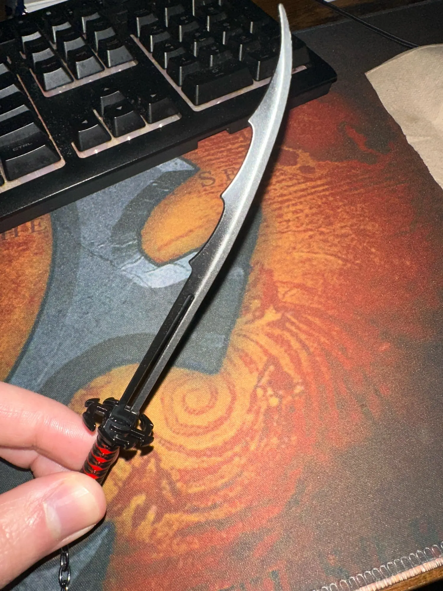 Foto de un comprador: Llavero de BLEACH con espada metálica de 14 cm