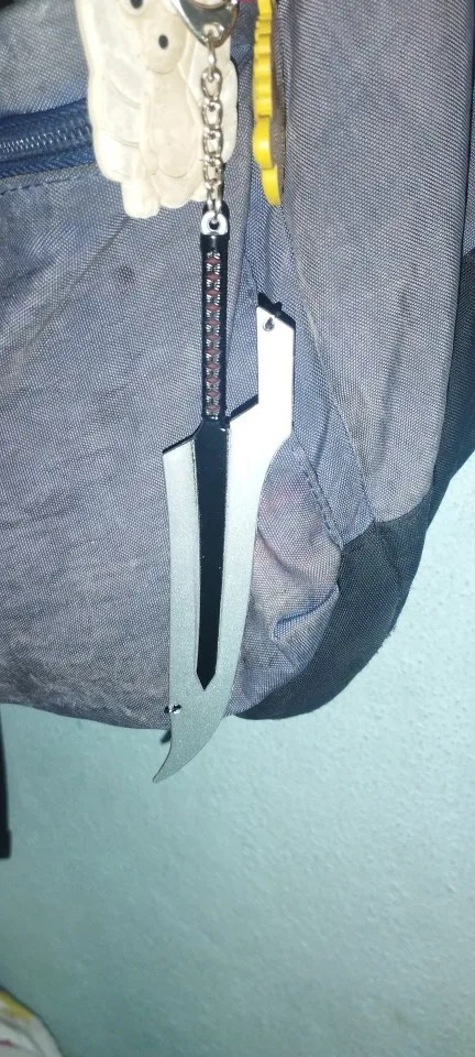 Foto de un comprador: Llavero de BLEACH con espada metálica de 14 cm