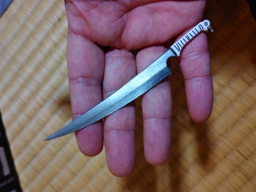Foto de un comprador: Llavero de BLEACH con espada metálica de 14 cm