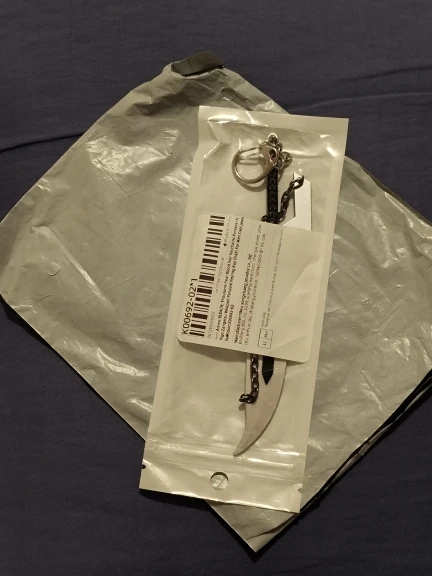 Foto de un comprador: Llavero de BLEACH con espada metálica de 14 cm